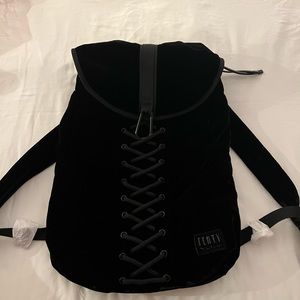 Fenty by Puma Limited Edition black velvet lace up back pack w/ dustbag